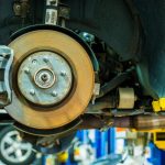 Cars being serviced for braking system