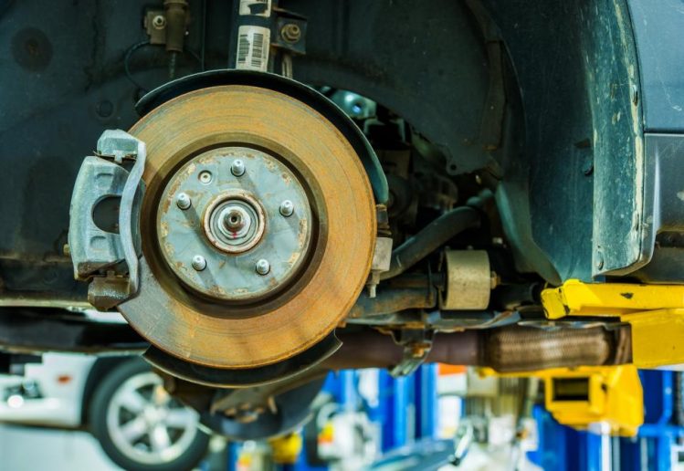 Cars being serviced for braking system