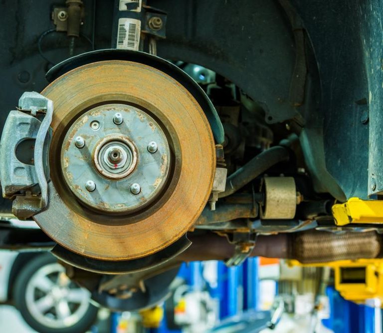 Cars being serviced for braking system